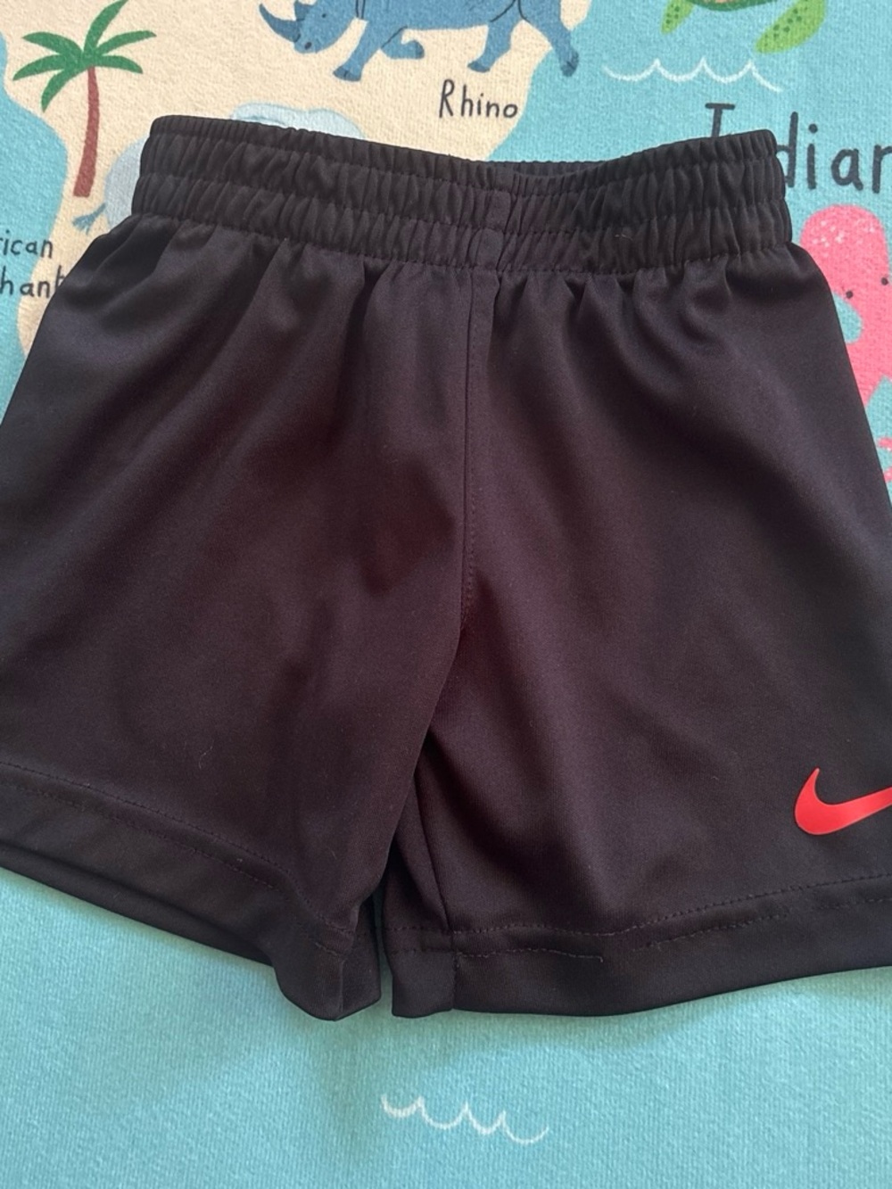 Nike Black Kids Athletic Shorts with Red Swoosh